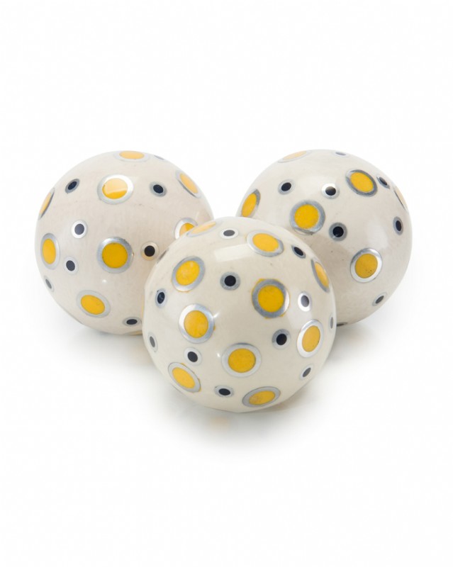 A Black and Yellow Dot Ball