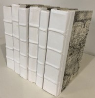 A Set Of Six Decorative White Books