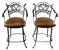 A Pair of Wrought Iron Counter Stools