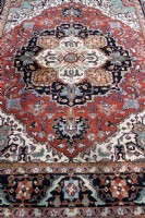 Herez Rust Wool Area Rug